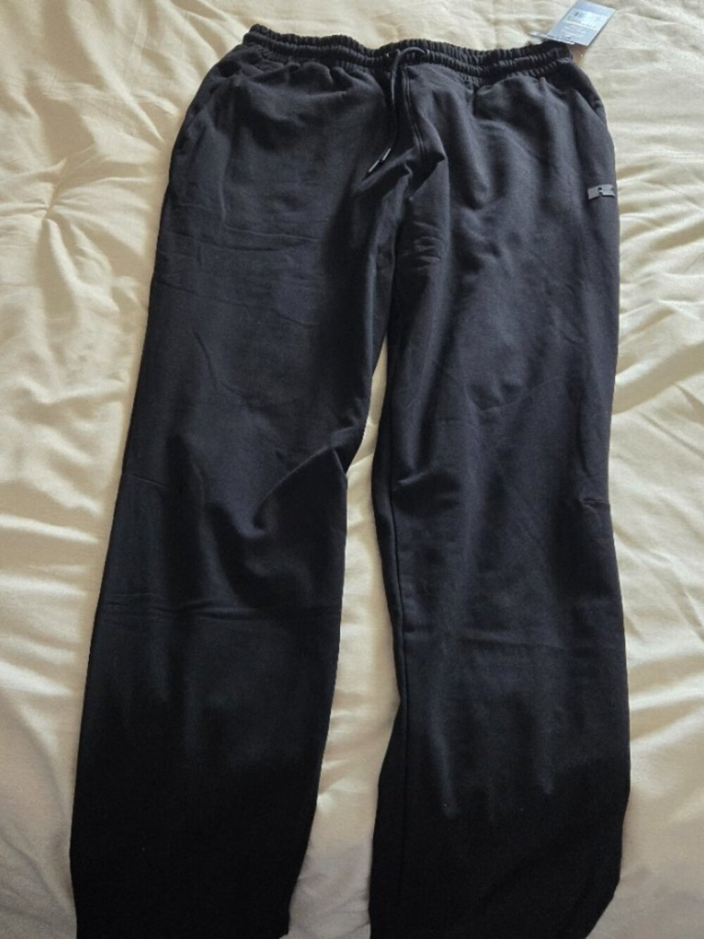 black tapered sweat pants